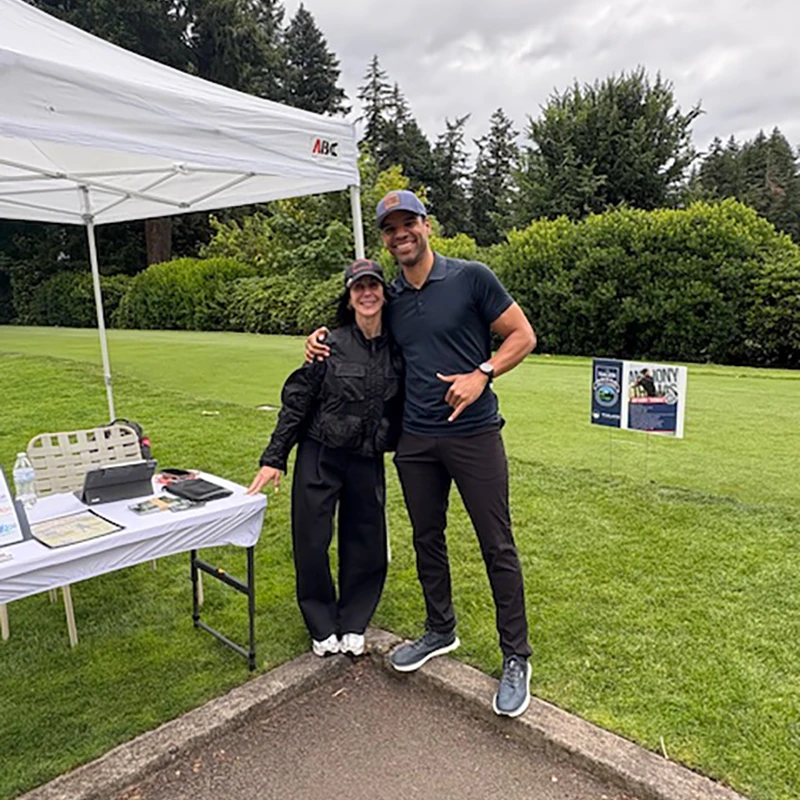 Guests at the ABC Supply booth during the Tualatin Chamber Golf Classic in Tualatin, Oregon.