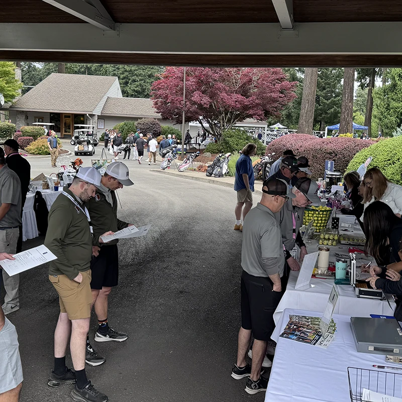 Golfers check in at the Tualatin Chamber Golf Classic in Tualatin, Oregon.