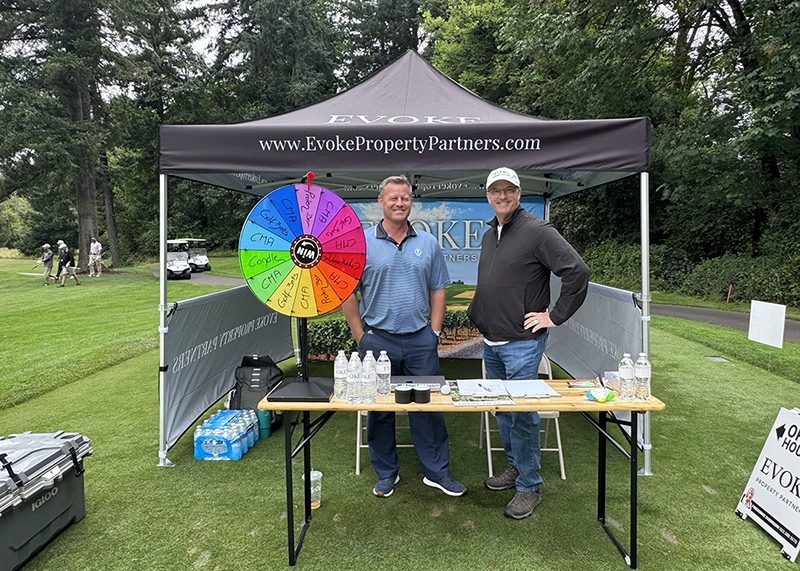 Evoke Property Partners booth at the Tualatin Chamber golf event in Tualatin, Oregon.