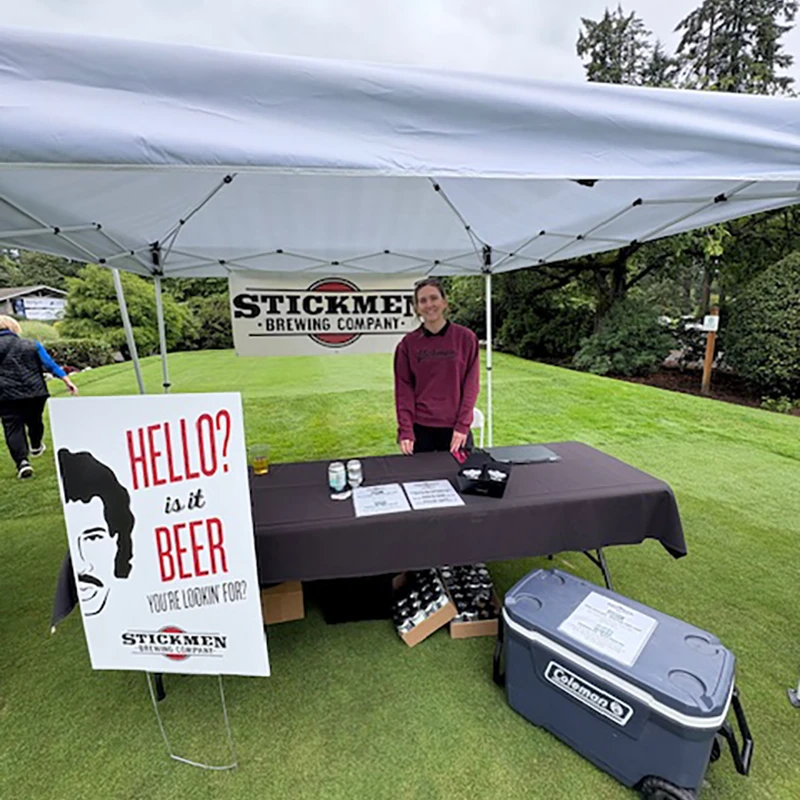 Stickmen Brewing Company booth at the Tualatin Chamber Golf Classic in Tualatin, Oregon.